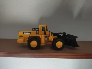 Excavadora de metal a escala