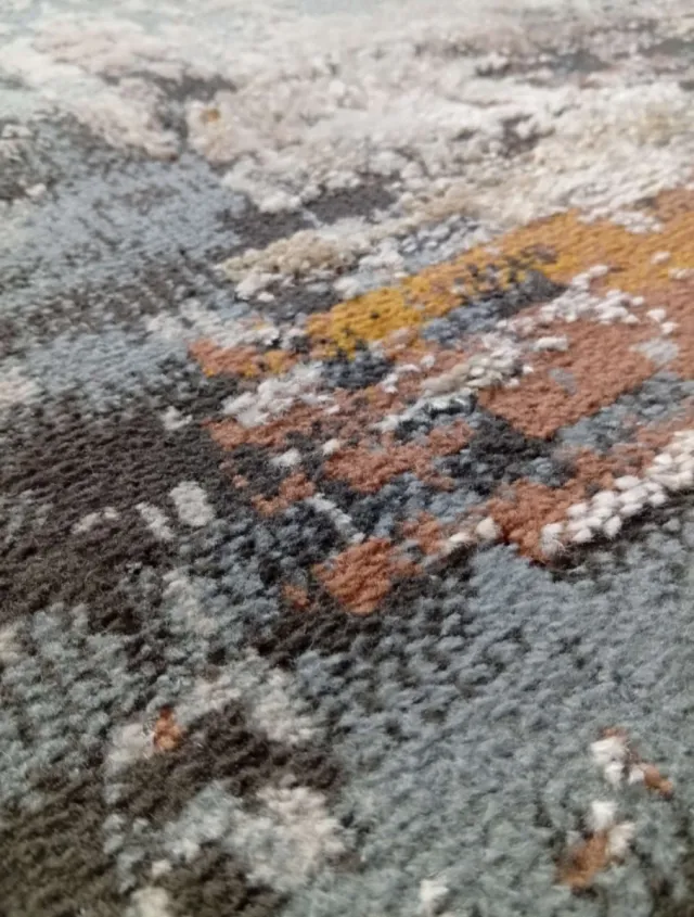 Alfombra abstracta gris y multicolor