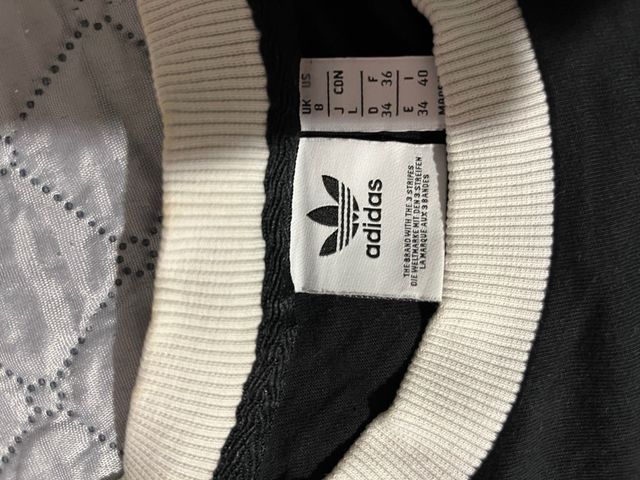 Maglietta Adidas nera con strisce bianche