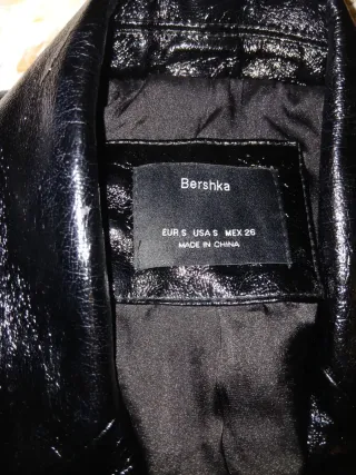 Torera negra brillante