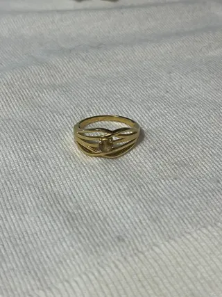 Anello in acciaio dorato con pietra gialla