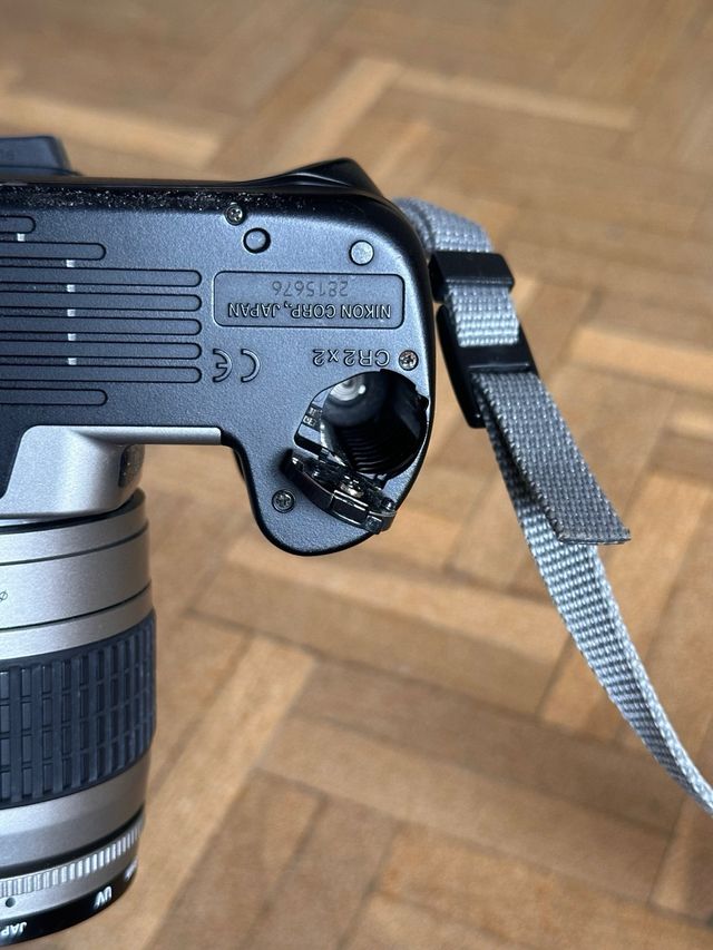 Cámara Nikon F65 + objetivos + funda