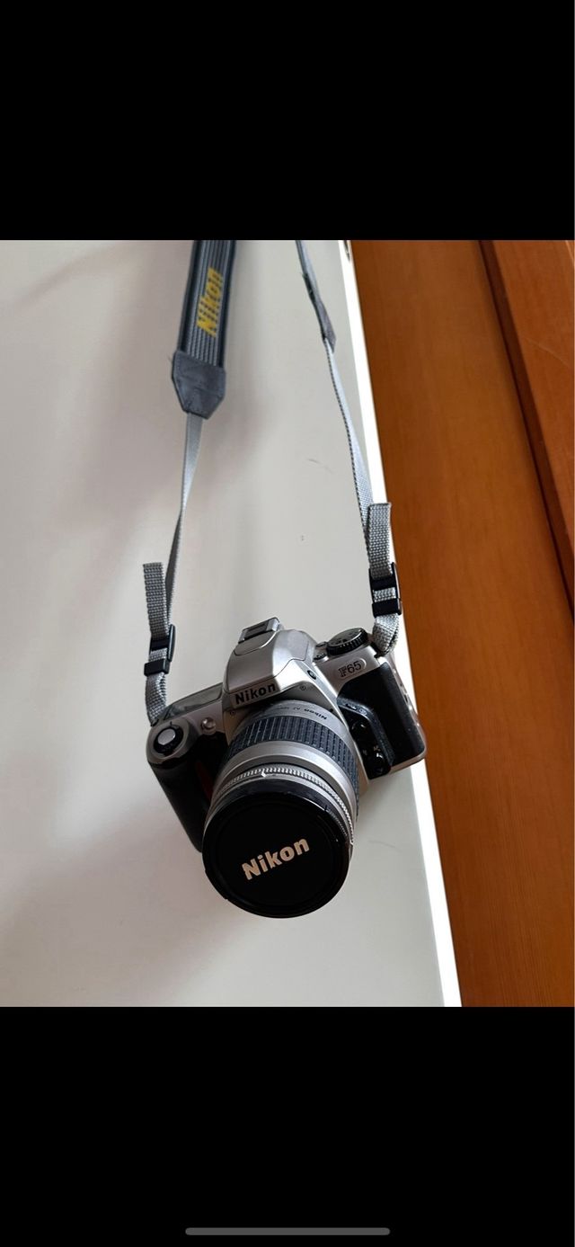 Cámara Nikon F65 + objetivos + funda