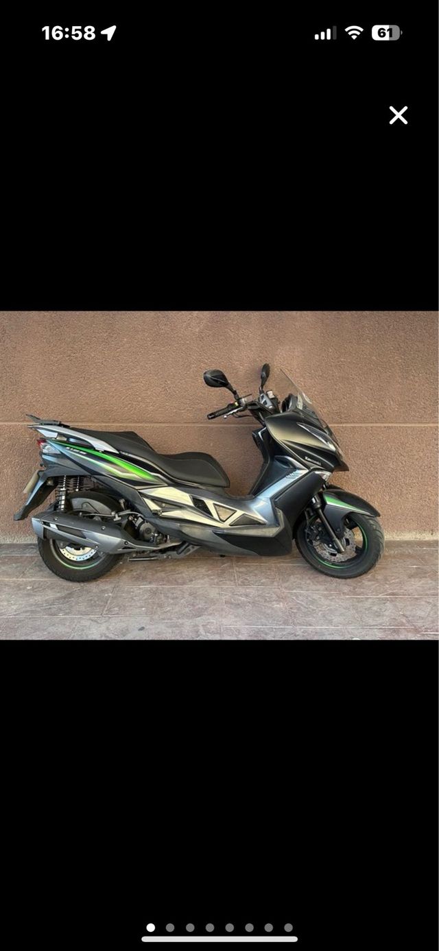 Alquiler Moto Kawasaki 125cc Negra y Verde