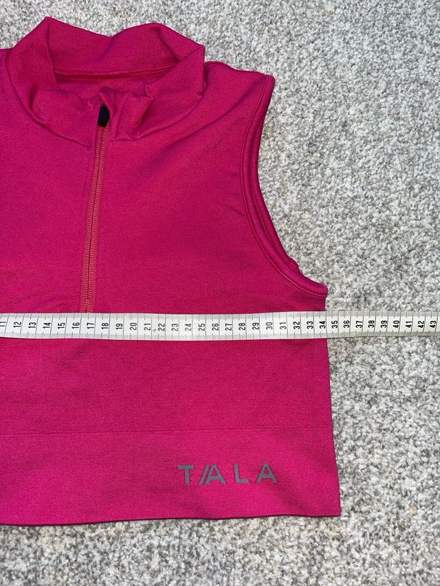 Top deportivo TALA sin mangas cremallera