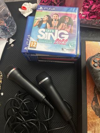 PS4 Pro 1TB + 2 Mandos + 6 Juegos+ microfonos sing