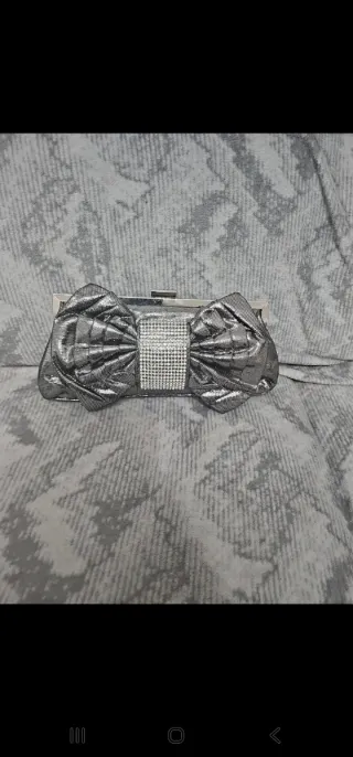 Pochette donna argento con fiocco