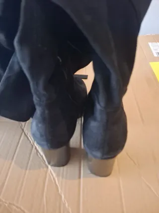 Botas altas por encima de la rodilla