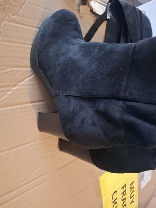 Botas altas por encima de la rodilla