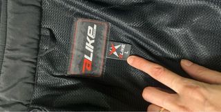 Giacca da moto nera con inserti bianchi