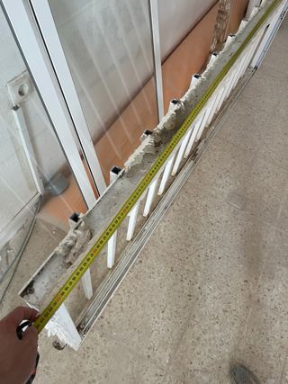 Ventana aluminio con rejas