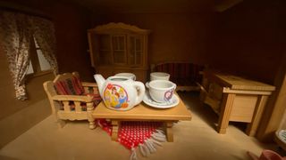 Casa de muñecas de madera