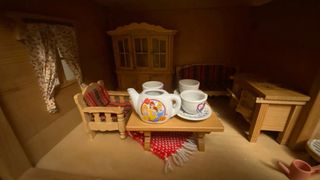 Casa de muñecas de madera