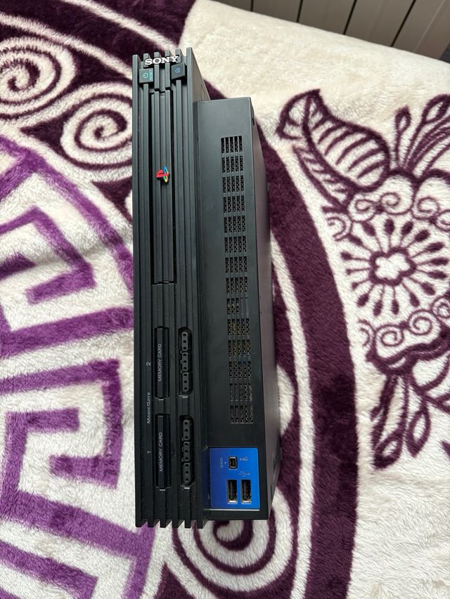 Consola PS2 + 2 Mandos + 19 Juegos.