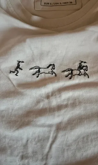 T-shirt bianca con disegno cavalli S