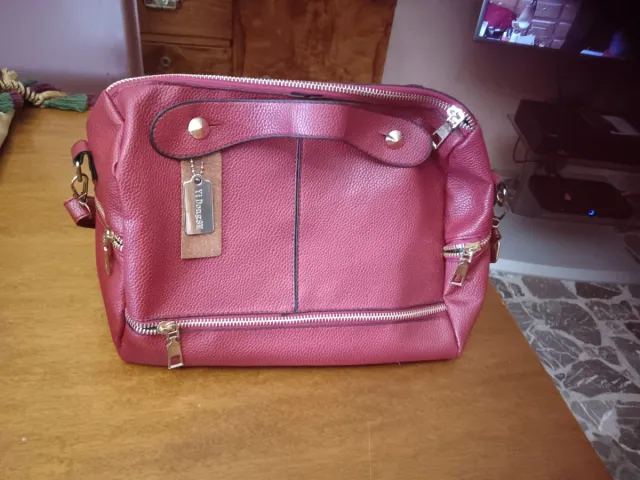 Borsetta rosa /fucsia con zip 