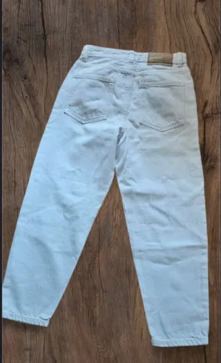 Jeans bianchi strappati