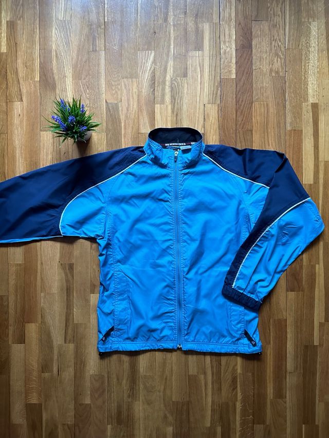 Cortavientos The North Face Azul y Negro