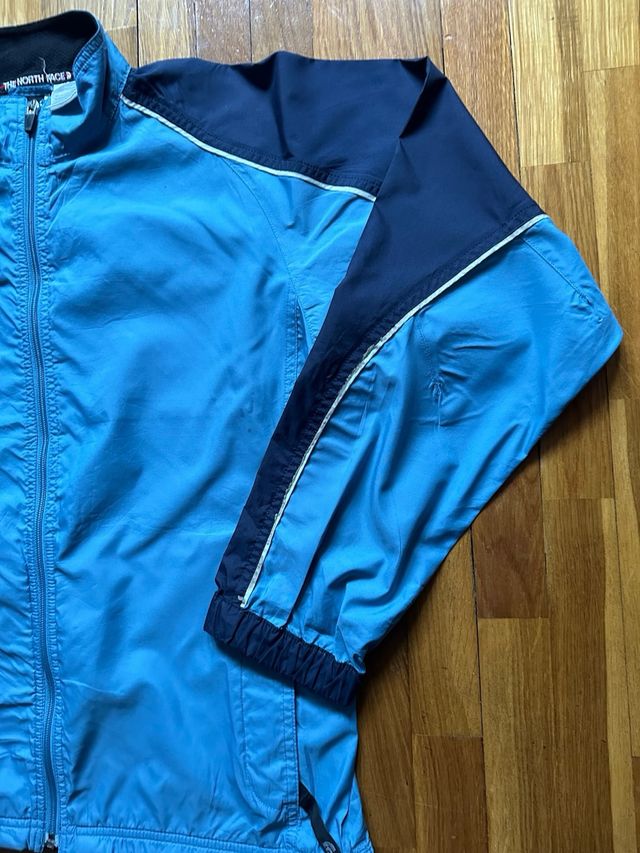 Cortavientos The North Face Azul y Negro