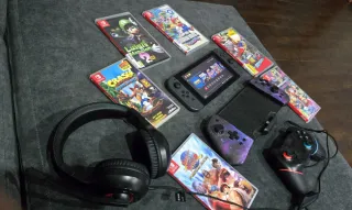 Nintendo Switch + 4 giochi + accessori