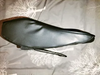 Cojín cervical de tela negro