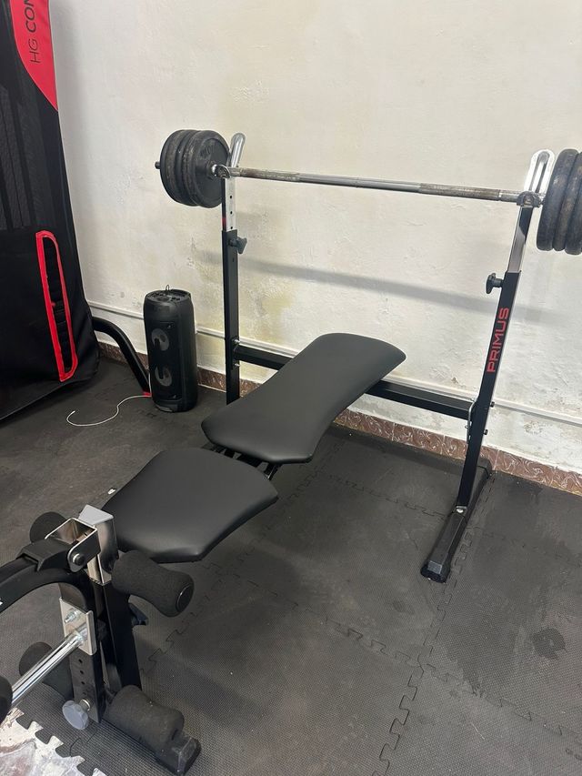 Press de banca con 60kg discos