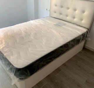 Canapé abatible blanco con colchón