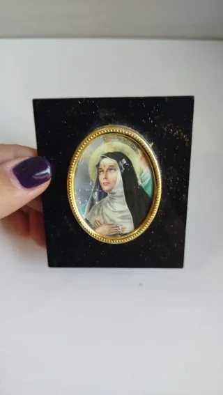 Decorazione religiosa su base nera