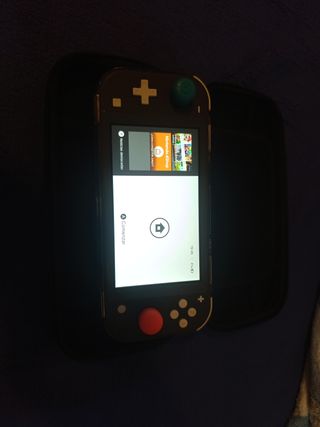 Nintendo Switch Lite + 2 Giochi