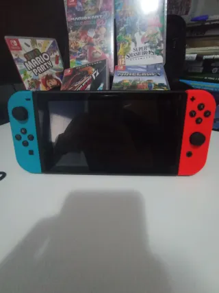 Pacchetto Nintendo Switch + accessori e 5 giochi!