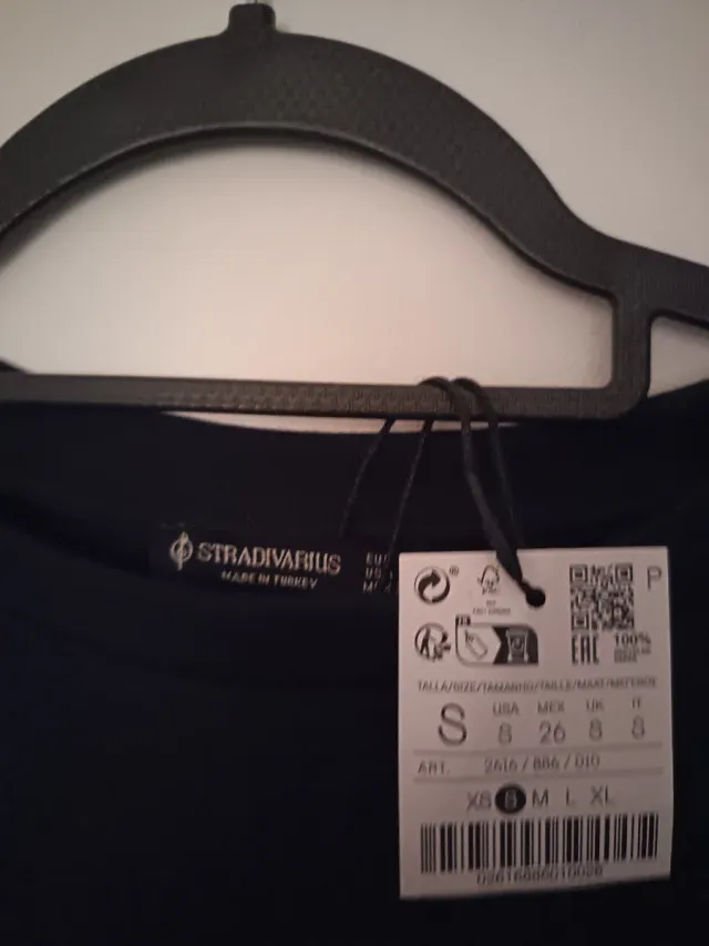 Jersey azul marino con falda de rayas