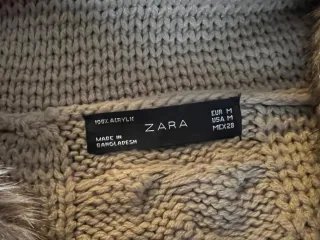 Chaqueta de punto beige con pelo