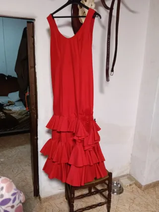 Traje de flamenca rojo con volantes
