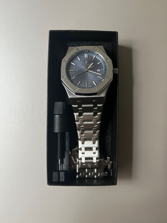 Reloj de acero inoxidable elegante - como nuevo