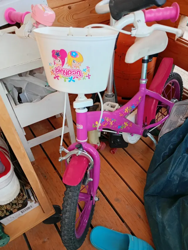 Bicicleta infantil rosa con cesta 14'
