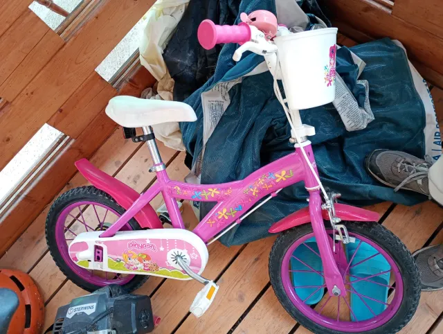 Bicicleta infantil rosa con cesta 14'