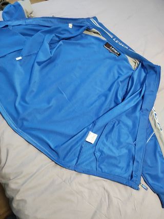 Chaqueta deportiva Legea azul y gris