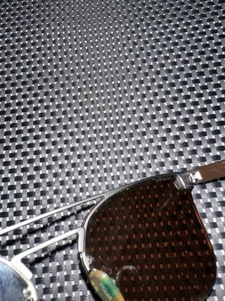 Gafas de sol Prada negras y marrones