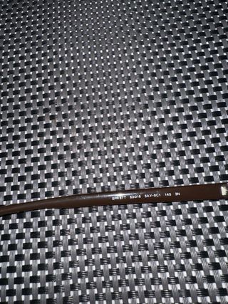 Gafas de sol Prada negras y marrones