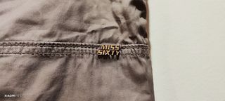 Pantalón cargo gris con puño