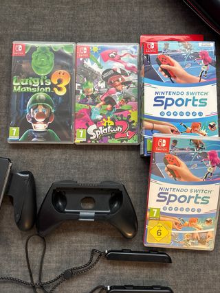 Nintendo Switch OLED + 3 Giochi e accessori
