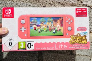 Nintendo Switch Lite Coral + Animal Crossing