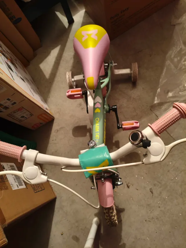 Bicicleta infantil rosa y verde