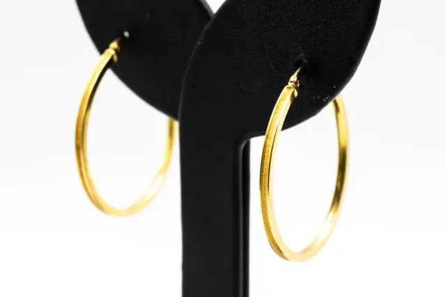 Orecchini a cerchio in oro 18k