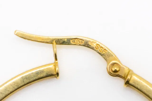 Orecchini a cerchio in oro 18k