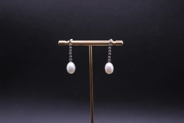 Pendientes  de plata de ley 925 largos con perla