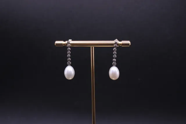 Pendientes  de plata de ley 925 largos con perla