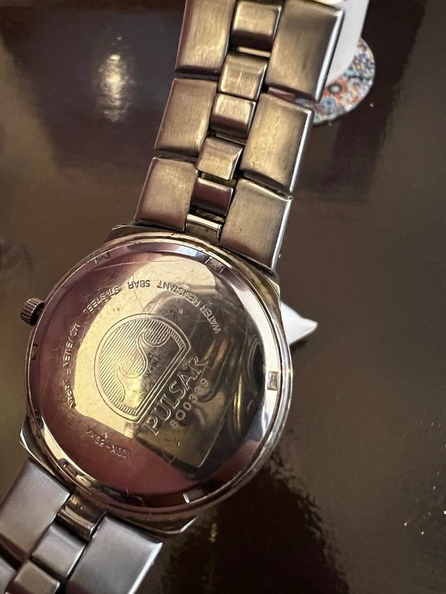 Reloj Pulsar Zafiro Dorado y Plateado