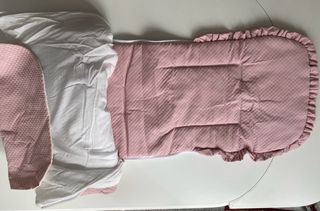 Saco de bebé rosa con estrellas