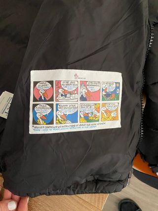 Giacca Moncler nera con pelliccia